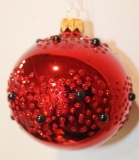 Red shiny bauble with red glitter & black dots