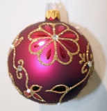 Burgundy glass bauble with gold glitter flower pattern