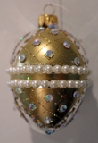 Decorated gold glass egg