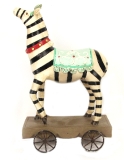 Resin zebra on wheels orn
