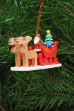 Santa Claus in Reindeer sled ornament